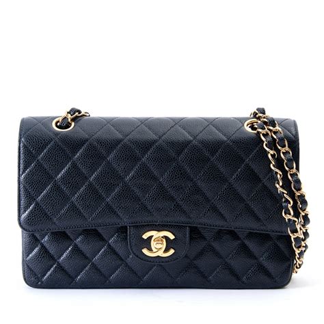 chanel mini timeless bag in black and gold leather|Chanel timeless classic flap bag.